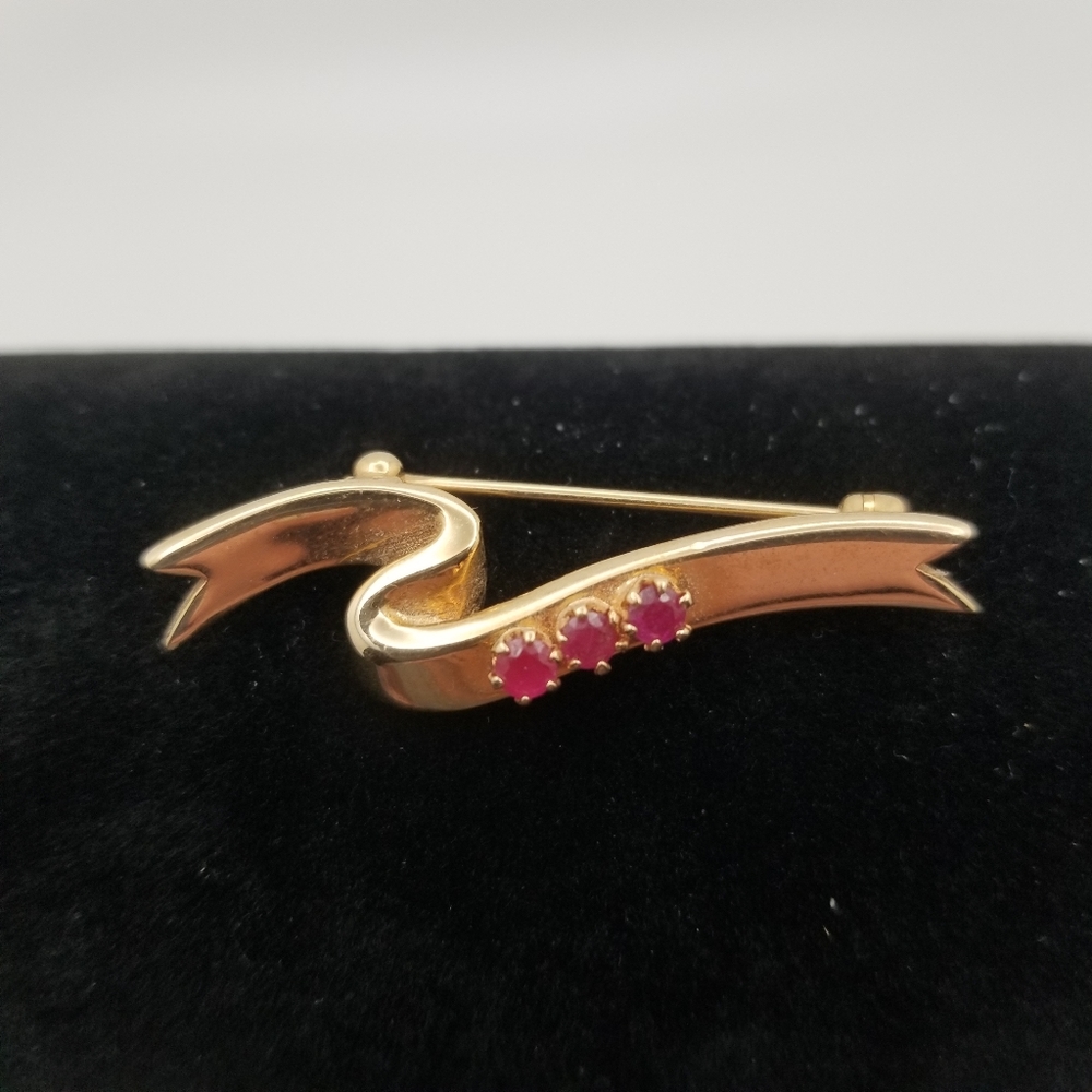 Avon president pin gold tone 3 Rubies brooch